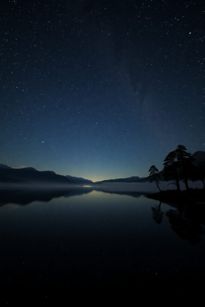 Calm Lake Under a Starry Reflection – free AI stock image
