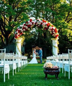 Elegant Wedding Ceremony Under a Floral Arch – free AI stock image