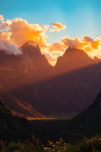 Majestic Mountains Under a Golden Sunset – free AI stock image