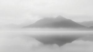 Misty Monochrome Mountain Reflection – free AI stock image