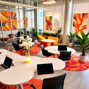 Modern Office Workspace with Technology and Diversity – free AI stock image
