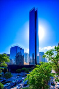 Modern Skyscraper Against a Blue Sky – free AI stock image