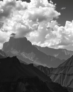 Monochrome Landscape Under a Cloudy Sky – free AI stock image