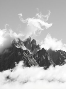 Monochrome Mountains Against a Misty Sky – free AI stock image