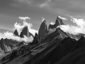 Monochrome Mountains Under a Cloudy Sky – free AI stock image