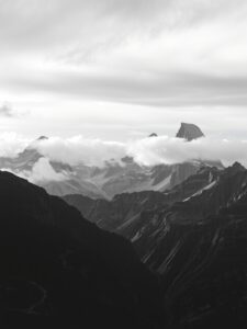 Monochrome Mountains Under a Dull Sky – free AI stock image