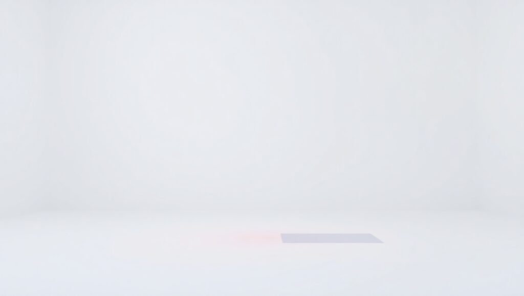 Red Cube in White Space – free AI stock image