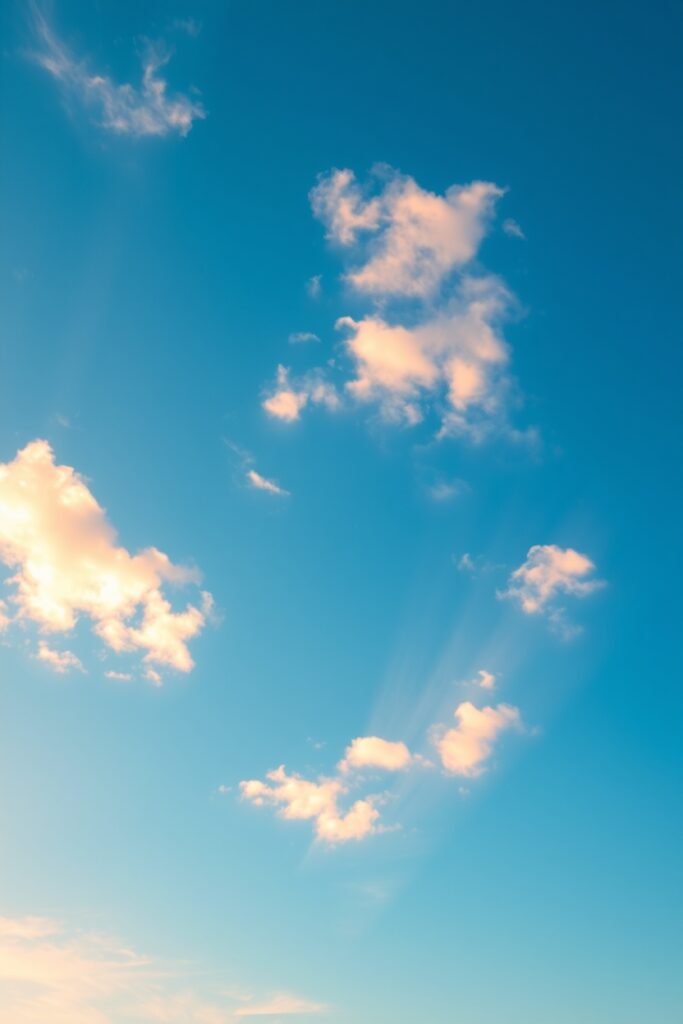 Serene Blue Sky with Wispy Clouds – free AI stock image
