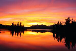 A Serene Lake at Sunset Reflecting Colors – free AI stock image