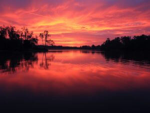 A Serene Lake at Sunset with Reflections – free AI stock image