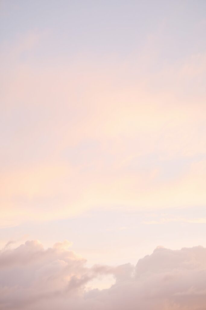 Serene Pastel Sky with Soft Clouds – free AI stock image