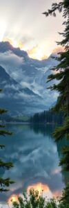 Serene Sunrise Over Misty Mountains – free AI stock image