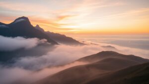 Serene Sunrise Over Misty Mountains – free AI stock image
