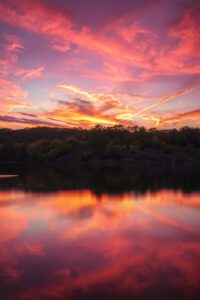 Serene Sunset Over a Calm Lake – free AI stock image