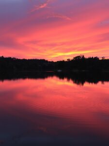 Serene Sunset Over Tranquil Lake – free AI stock image