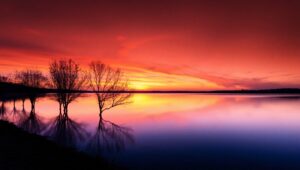 Serene Sunset Over Tranquil Lake – free AI stock image