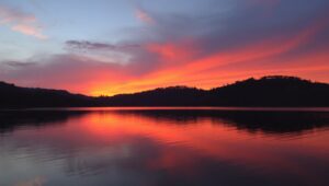 Serene Sunset Reflections on Water – free AI stock image