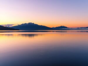 Still Lake Reflecting the Twilight Sky – free AI stock image