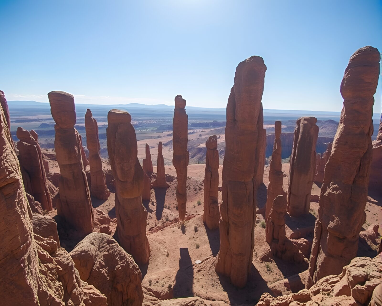 Towering, suspended monolithic pillars in a melancholic setting