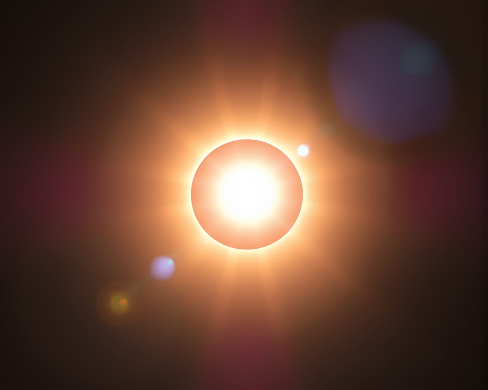 Stunning solar eclipse with glowing sun and lens flare