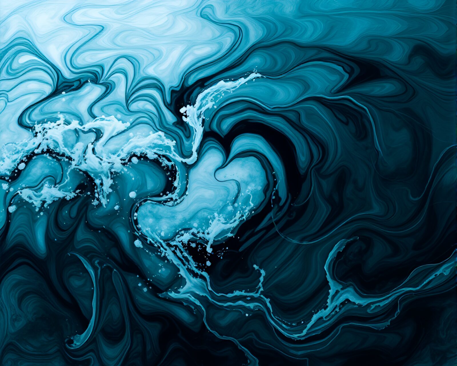Swirling ink creating ocean patterns in dark abstract art