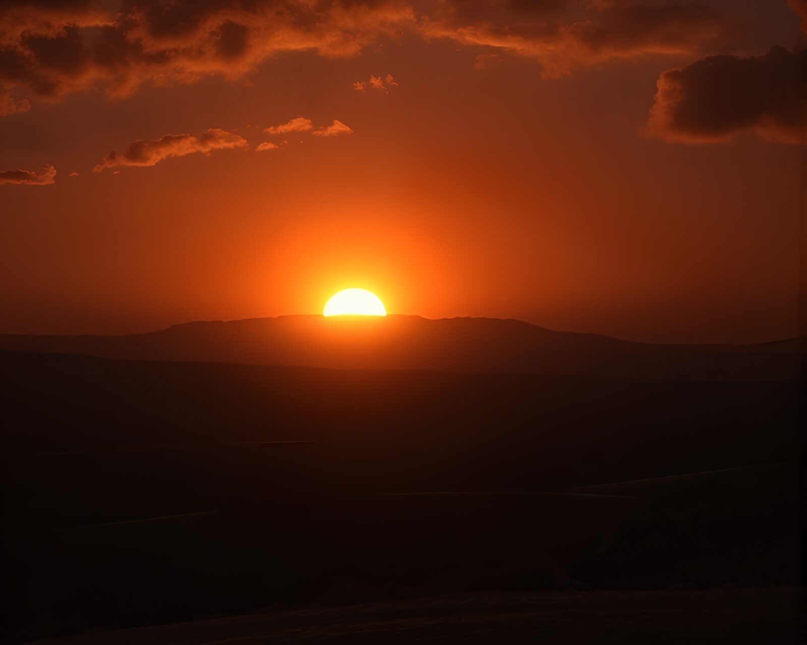 Majestic solar flare illuminating the ancient and tense landscape