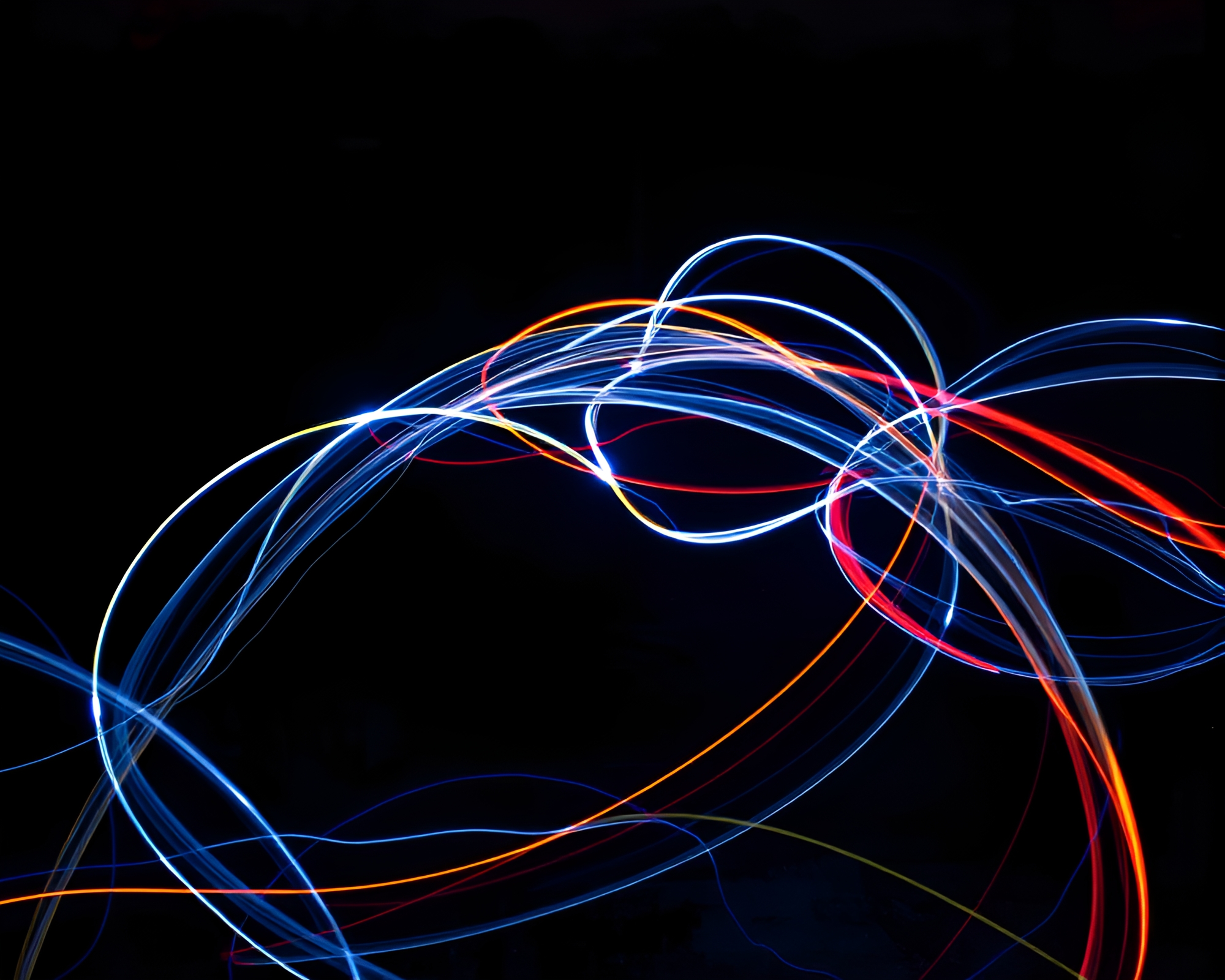 Dynamic Kinetic Light Trails Dance in Darkness – free AI stock image