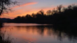 Serene Sunset Reflections in Bokeh – free AI stock image