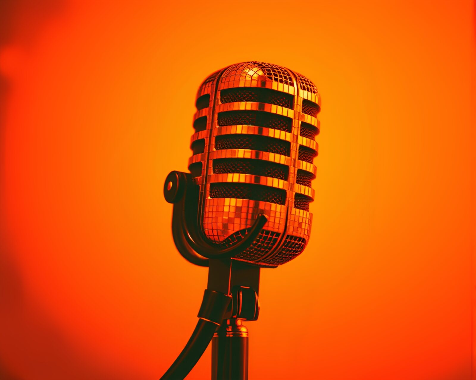 Spectacular tiled mosaic of microphone with sunset-orange lighting