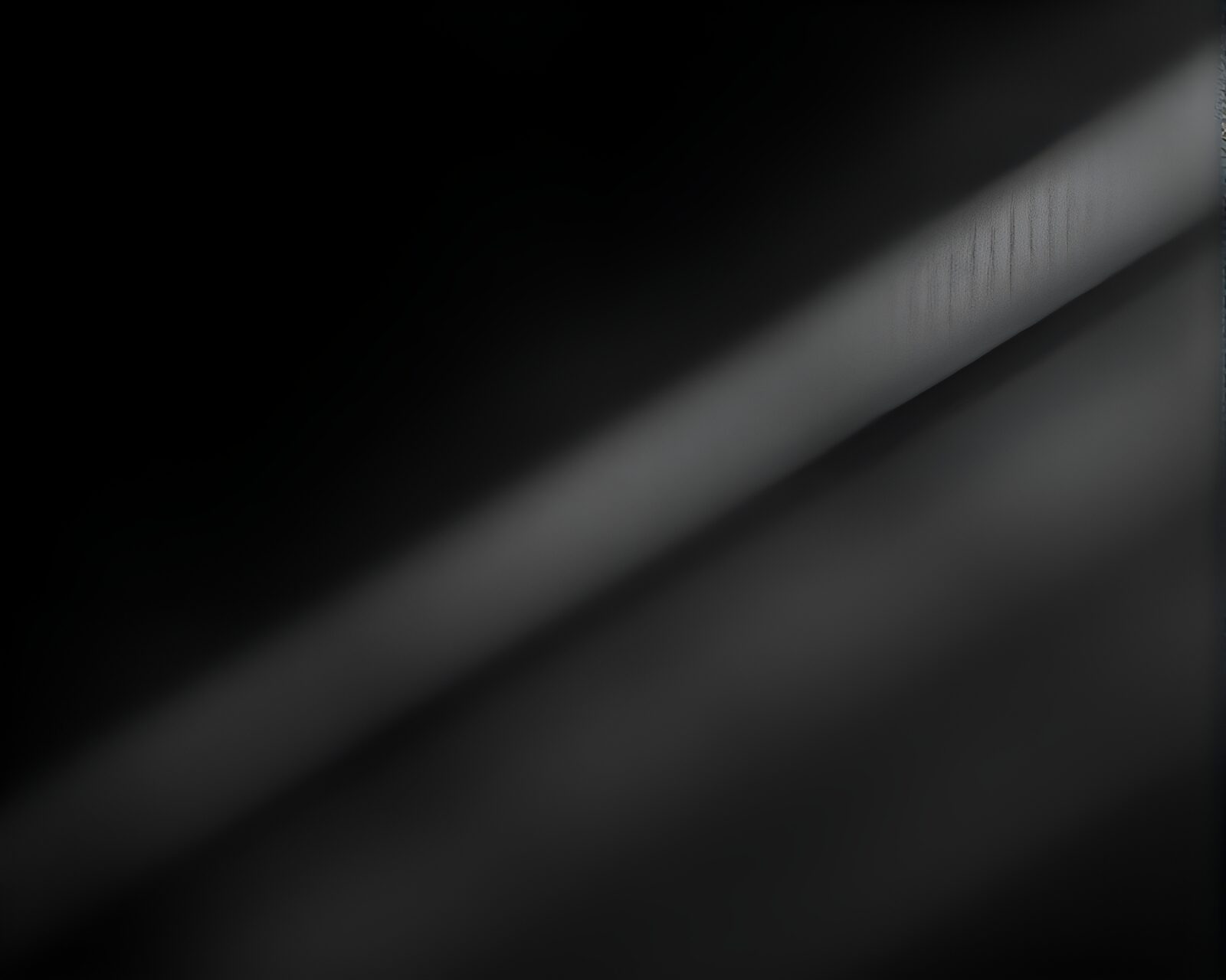 Crosshatching style image of dark satin ribbon under eclipse shadow