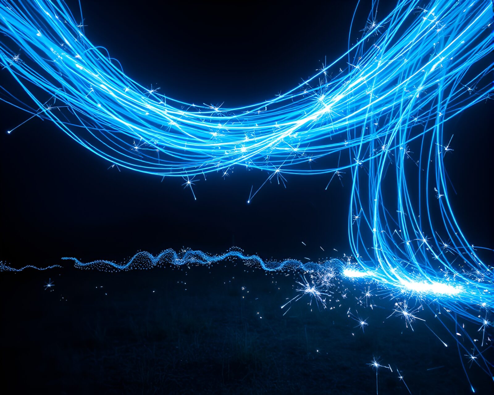 Glowing sparklers forming patterns in an arctic landscape