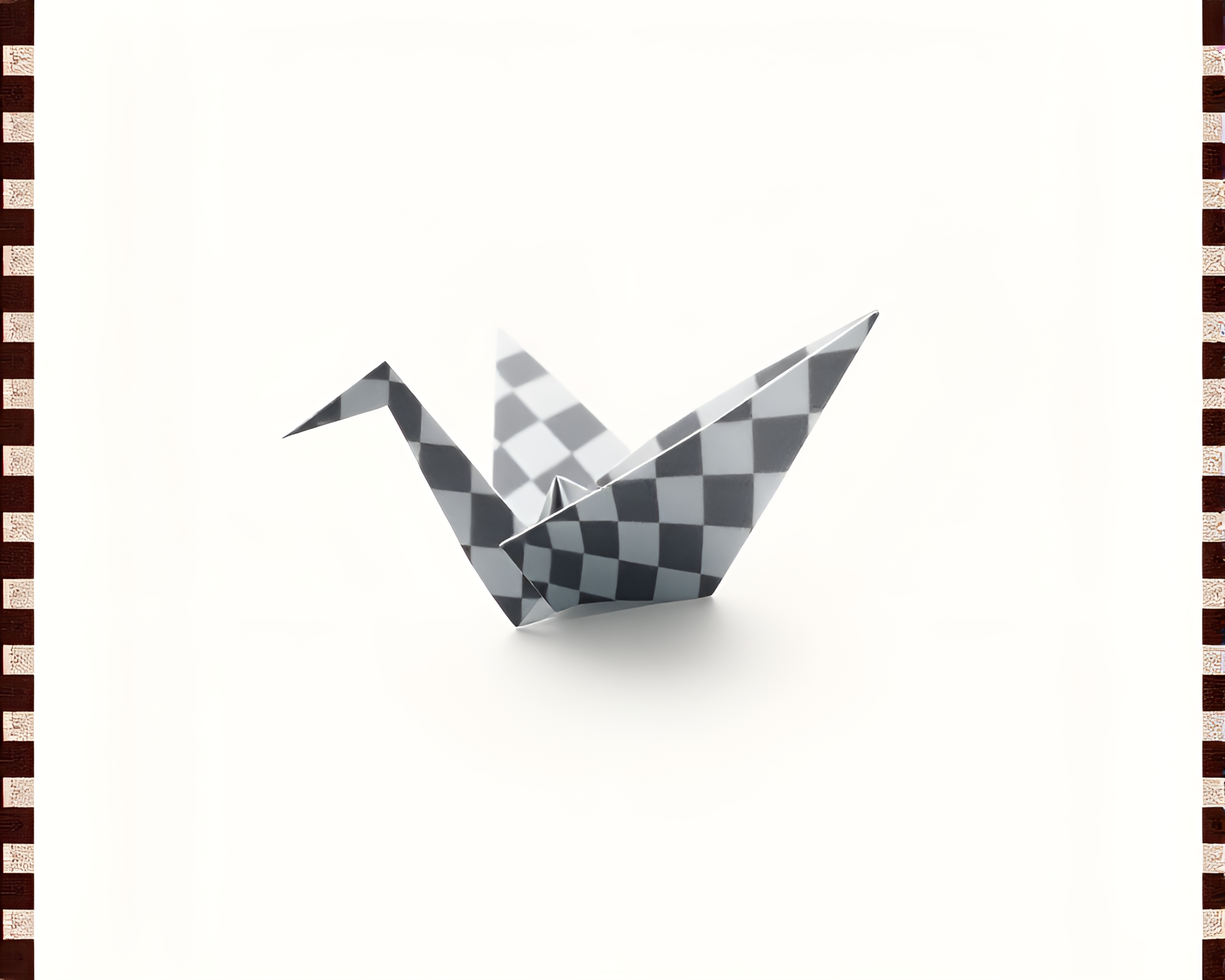 Misty Origami Crane with Checkered Film Strip Border – free AI stock image