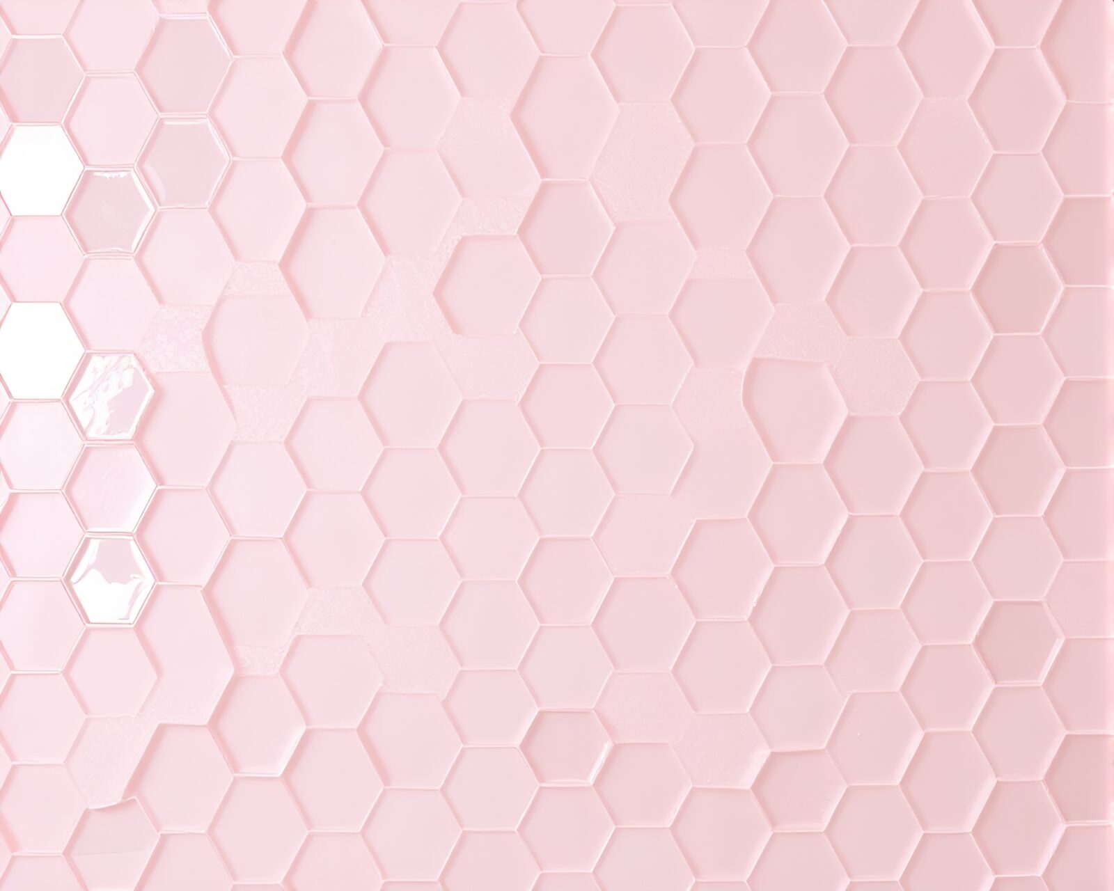 Abstract wireframe hexagonal glacier in soft pink hues.