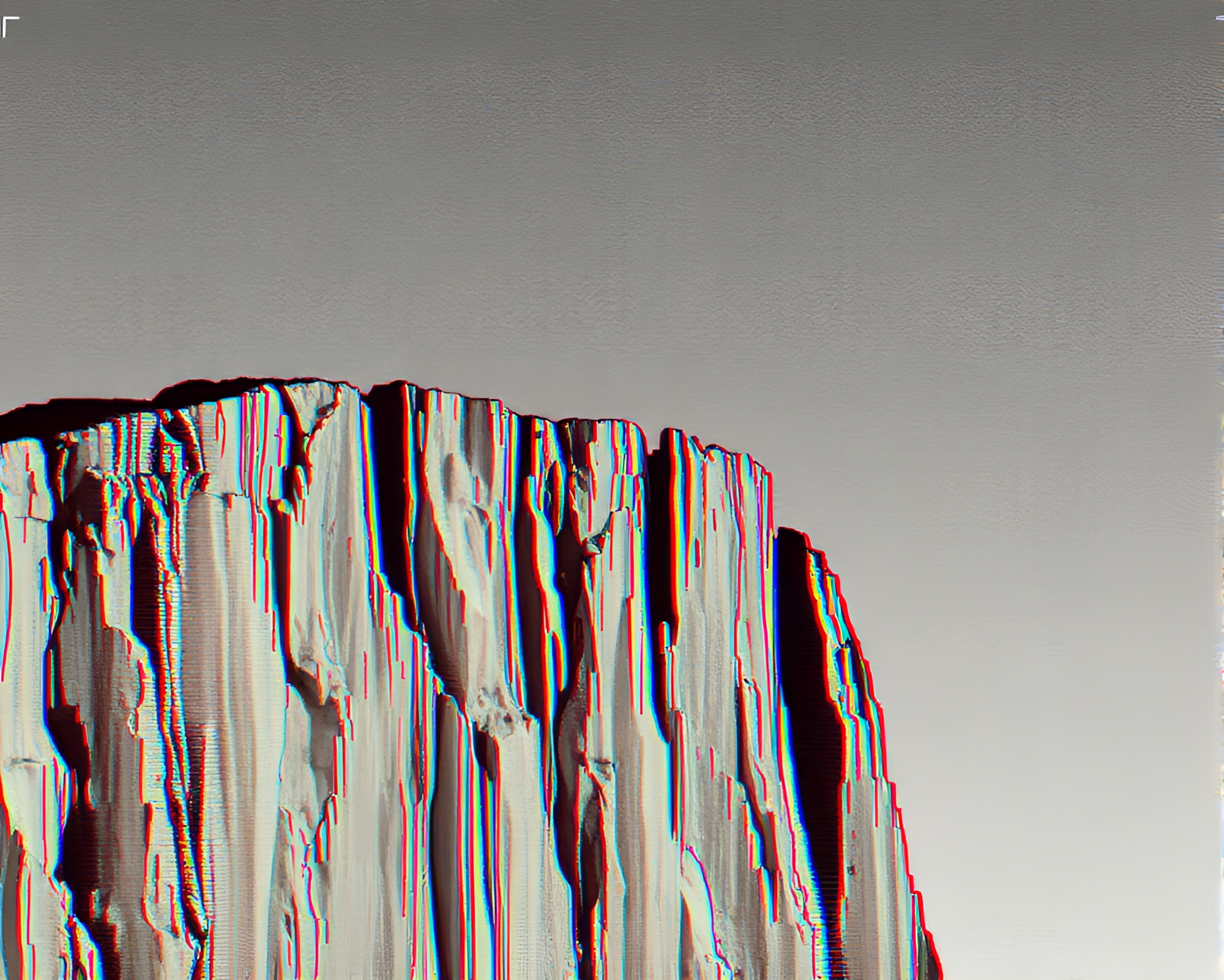 Glitch Artifacts on Desaturated Cliff Landscape – free AI stock image