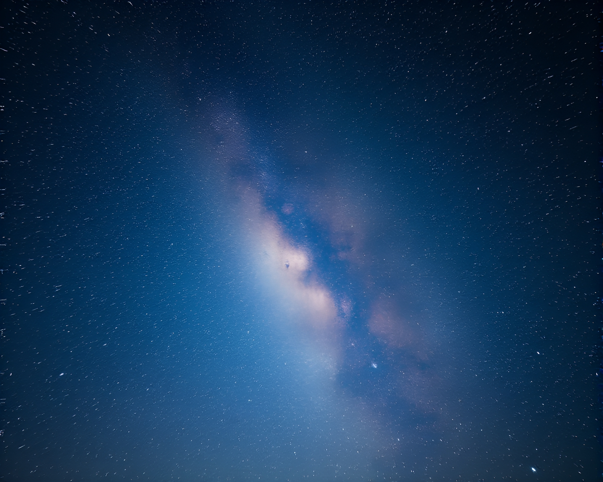Celestial Symphony: Snow-Kissed Nebula in Metallic Hues – free AI stock image