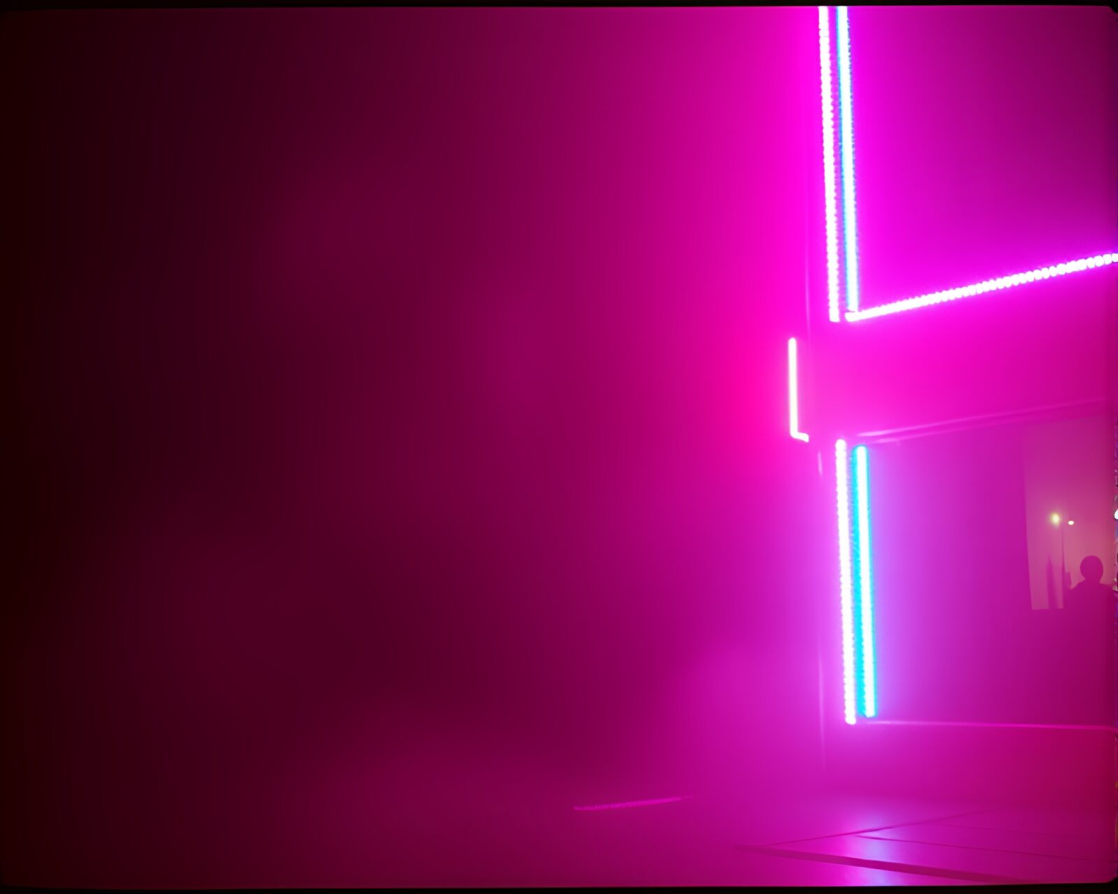 Fantastical dwarf surrounded by neon lights and film burns