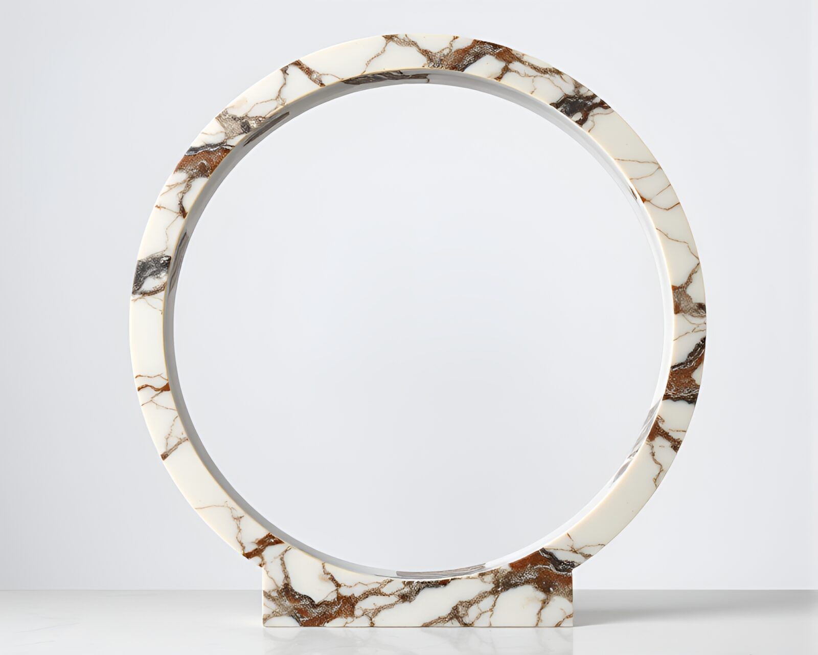 Circular framed marble statue with split toning lighting.
