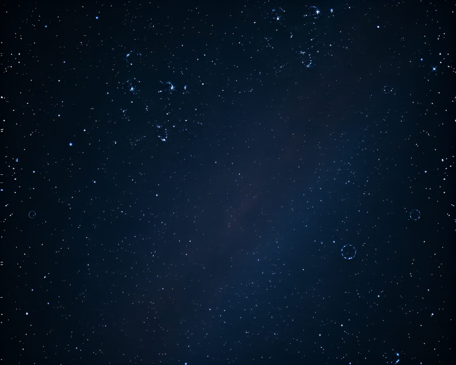 Starlit sky illuminates bubbles with alchemical symbols floating