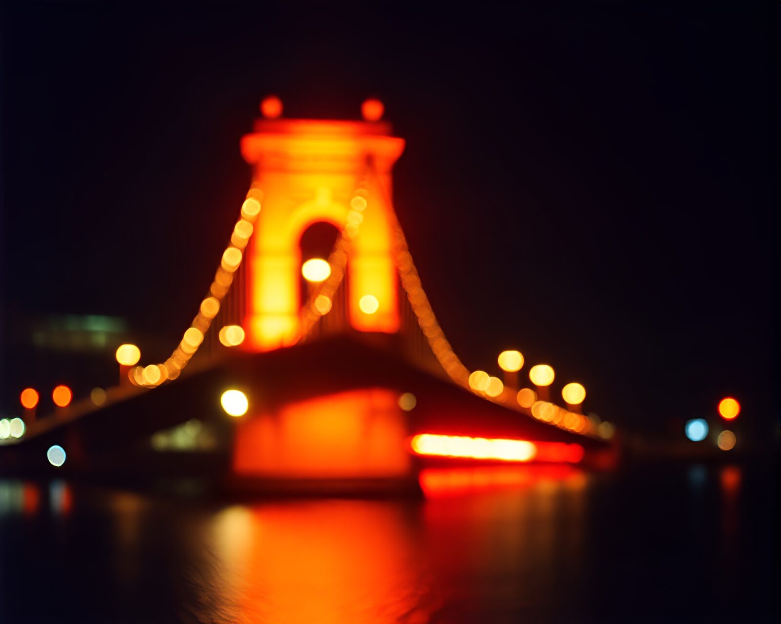 Majestic arch bridge engulfed in fiery film burns