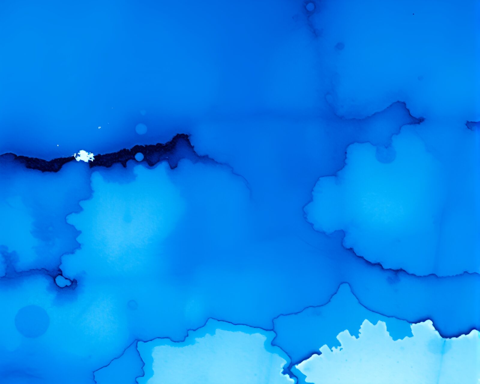 Abstract composition of ink splashes on blue obelisk in duotone
