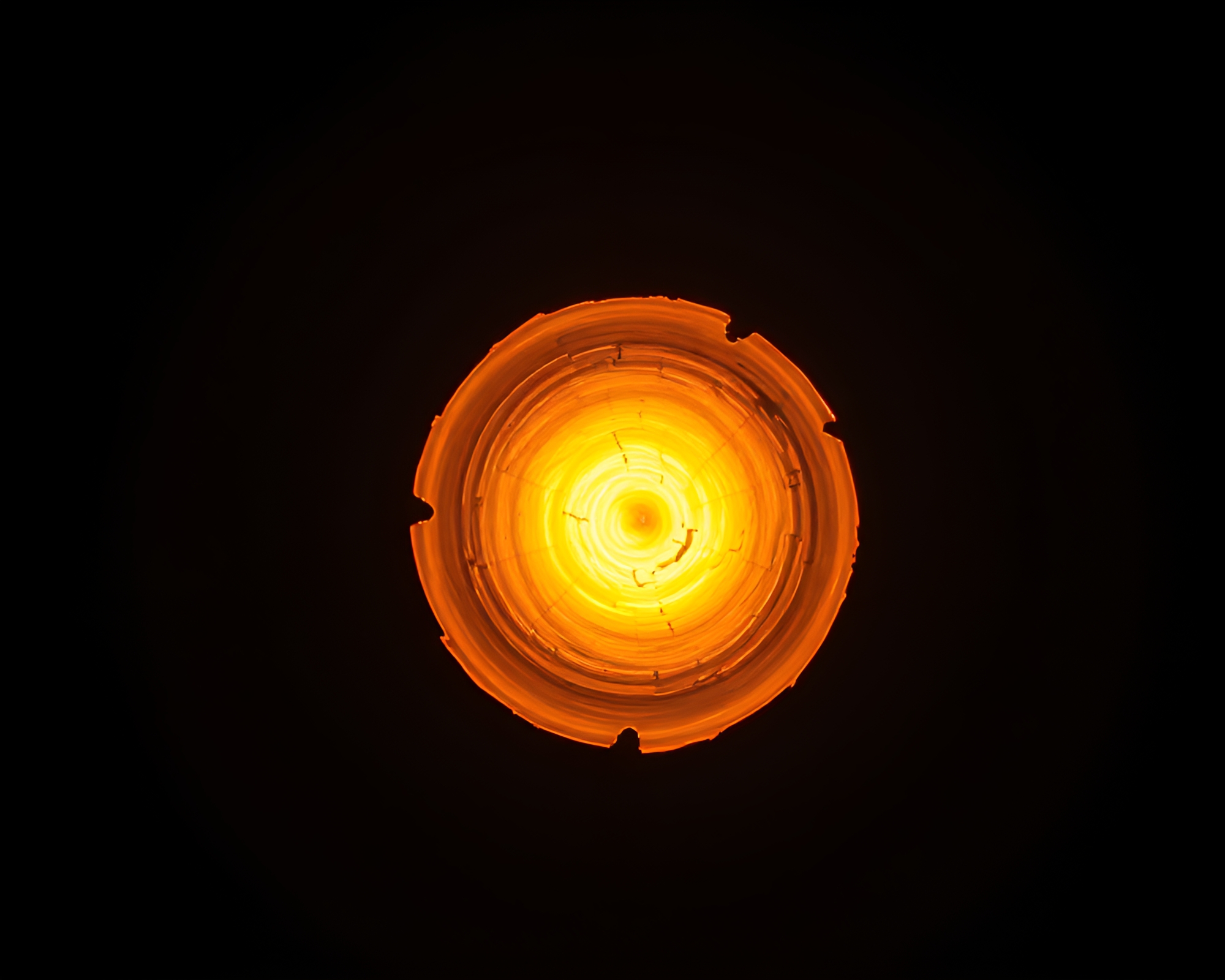 Drum illuminated by golden spiral under natural light – free AI stock image