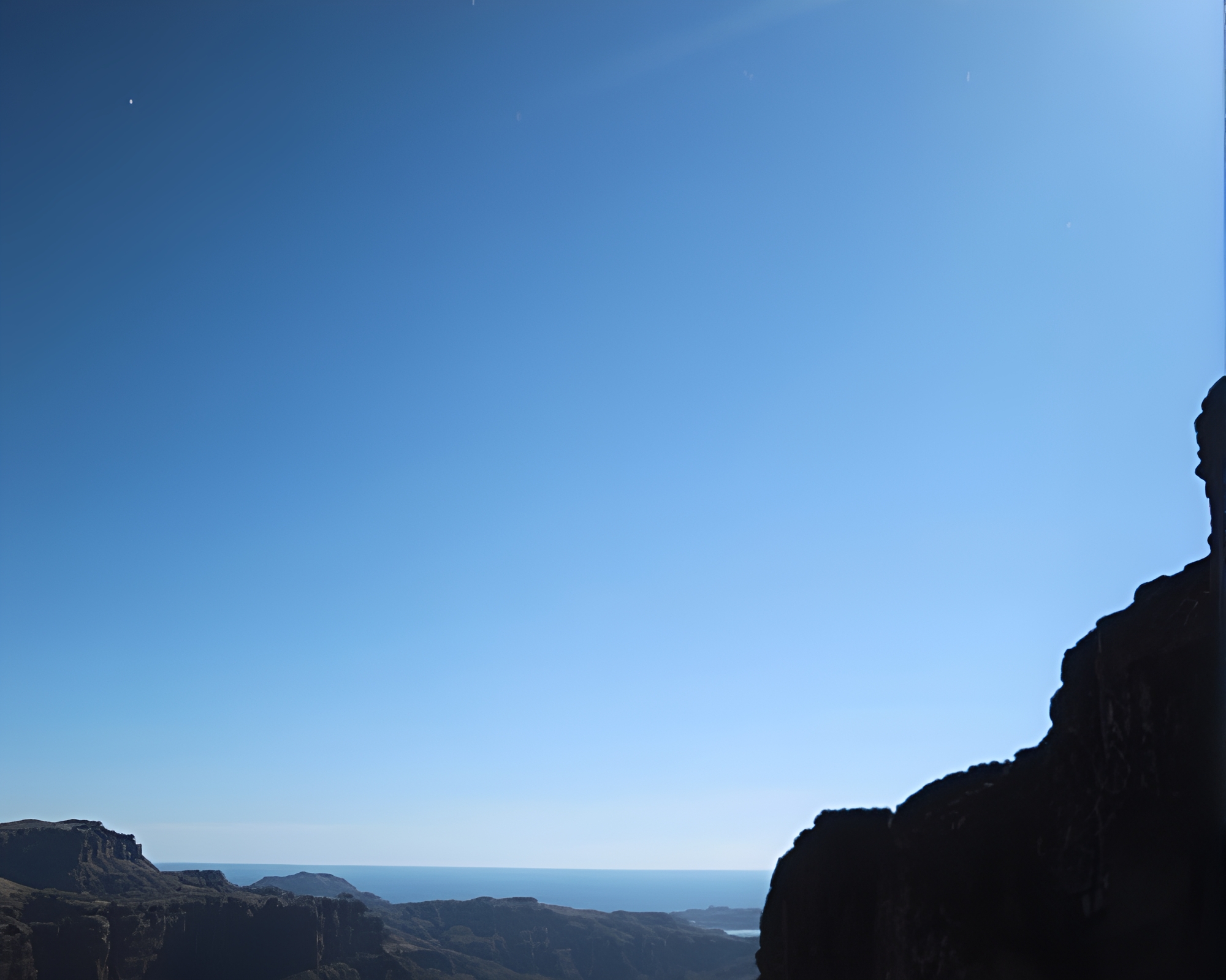Shattered Dreams: Reflection on Cliffside Shadows – free AI stock image