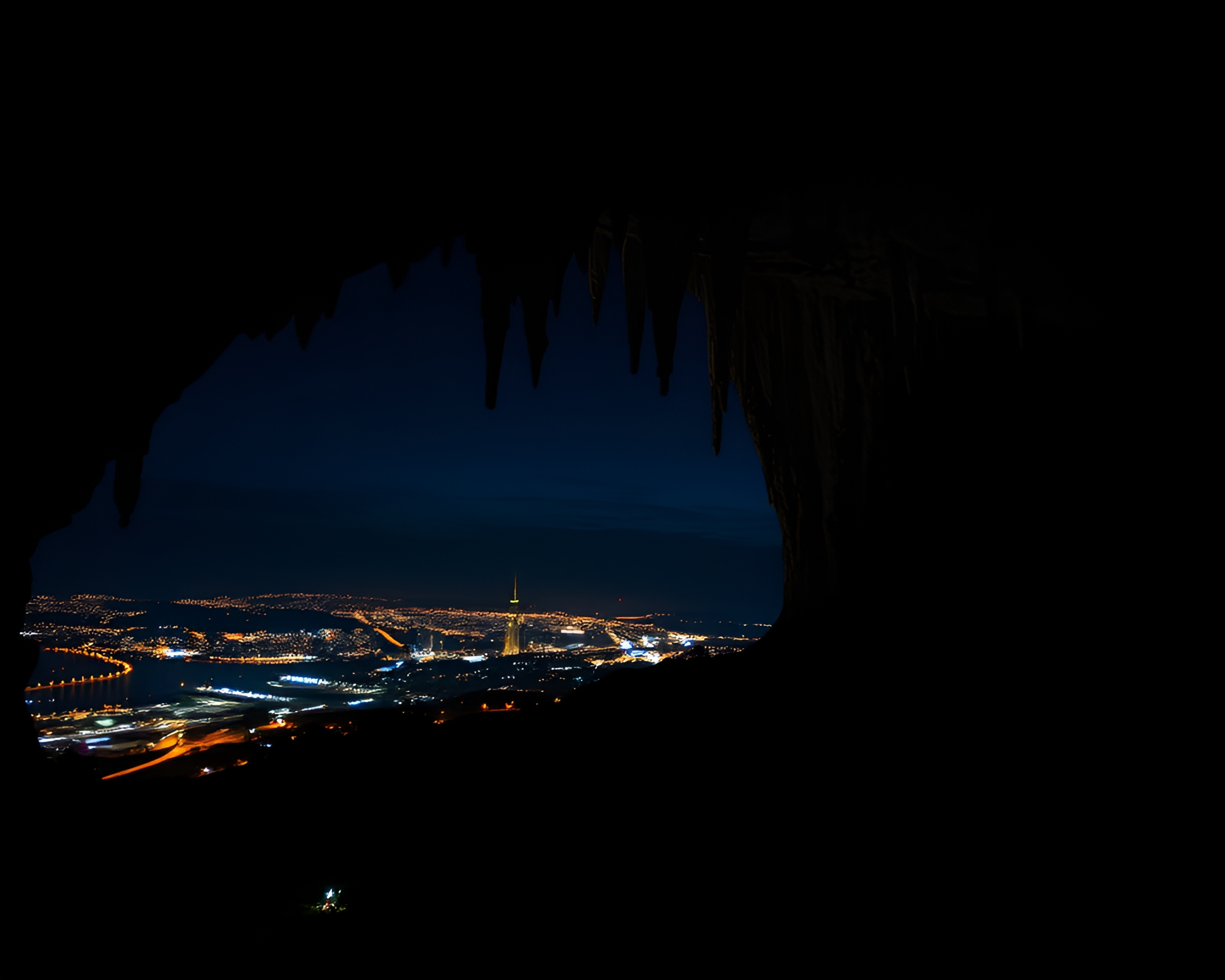 Stalactite Cityscape: A Night’s Illumination – free AI stock image