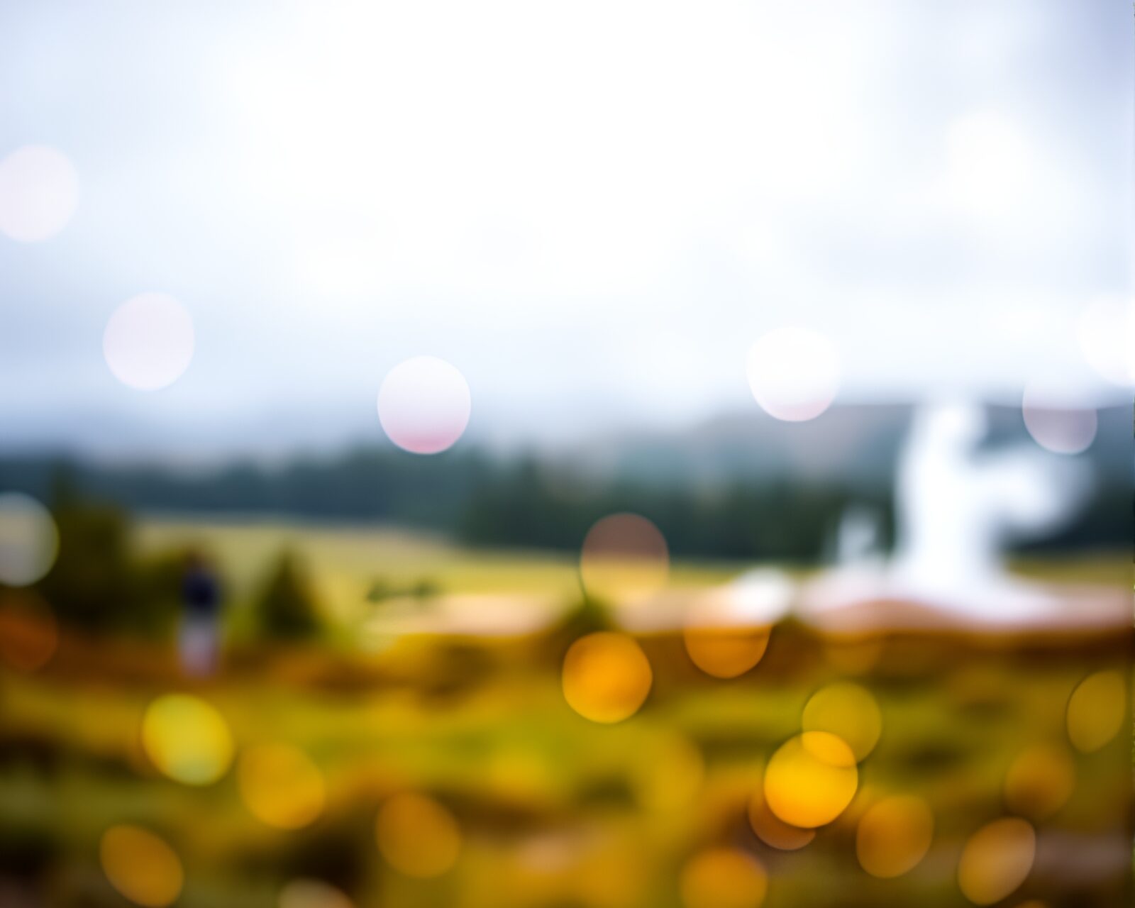 Surreal vector art of geyser field with bokeh foreground