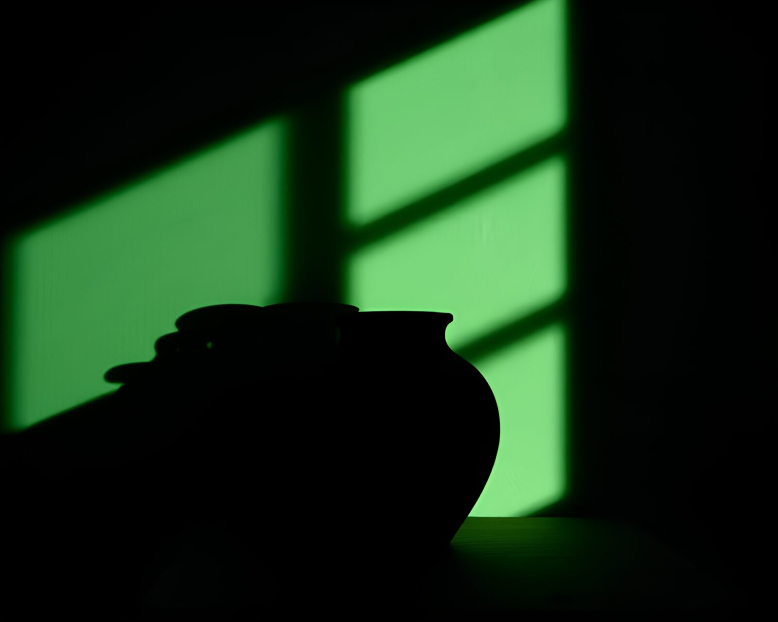 Ethereal image of pottery silhouette in serene forest setting