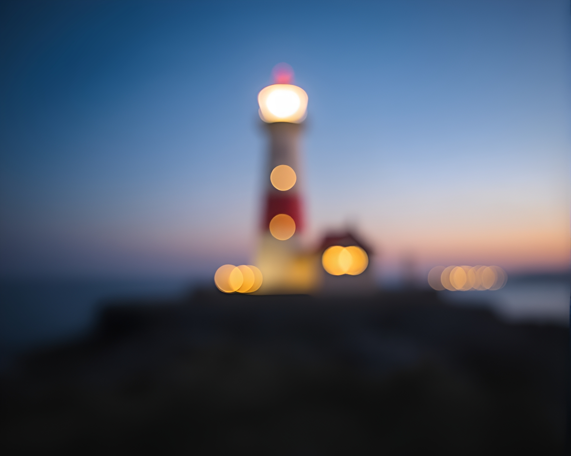 Luminous Lighthouse Beacon in Bokeh Glow – free AI stock image