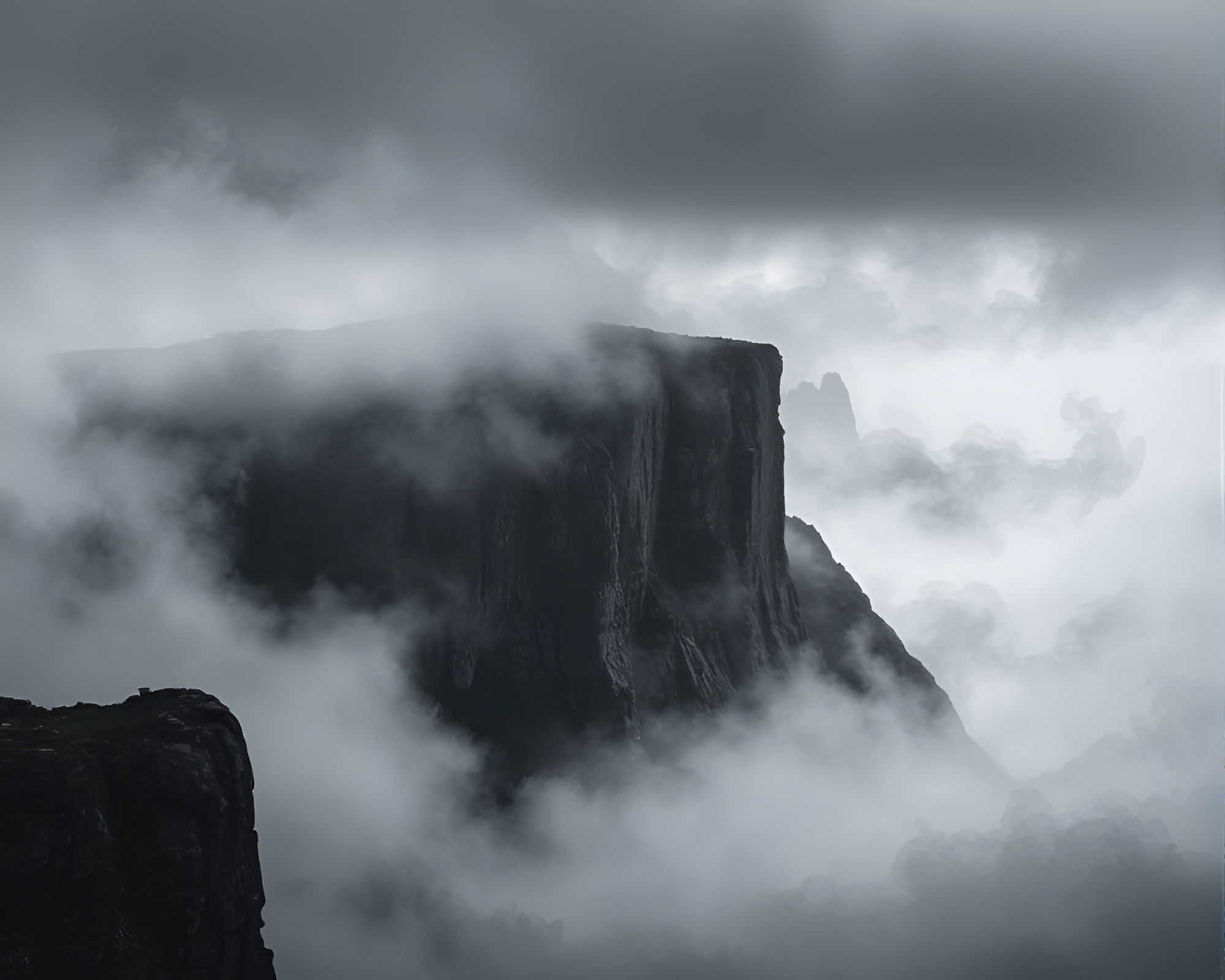 Charcoal Cliff Embraced by Misty Air – free AI stock image