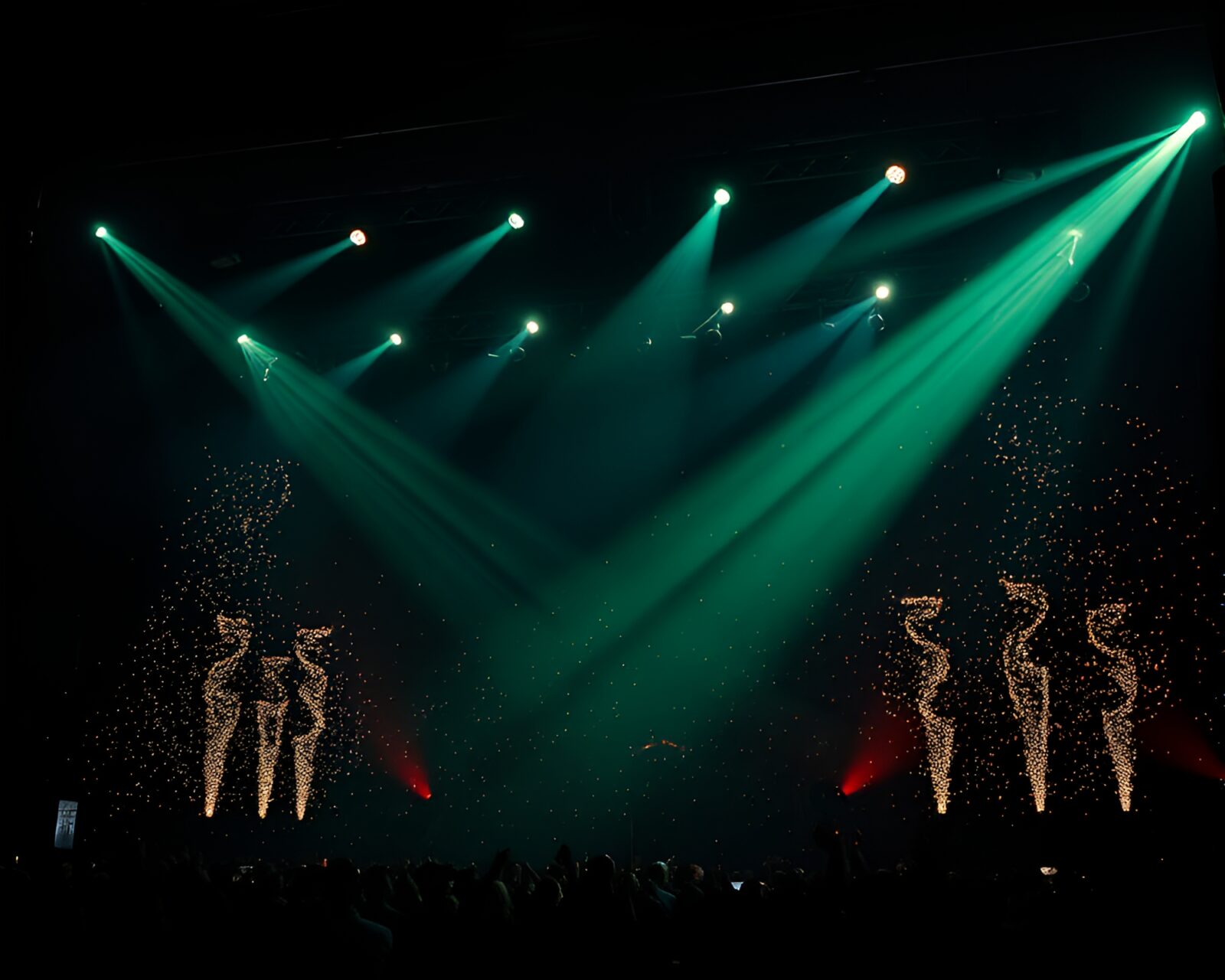 Ethereal goblin band on stage surrounded by floating particles