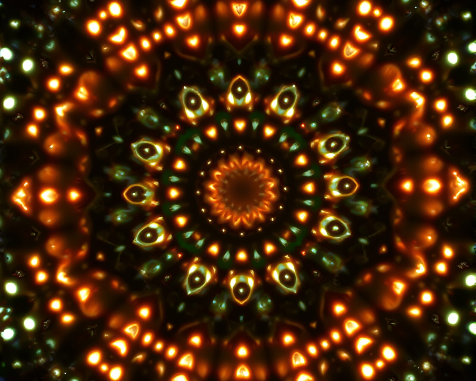 Intricate mandala design with mildew spots under torchlight