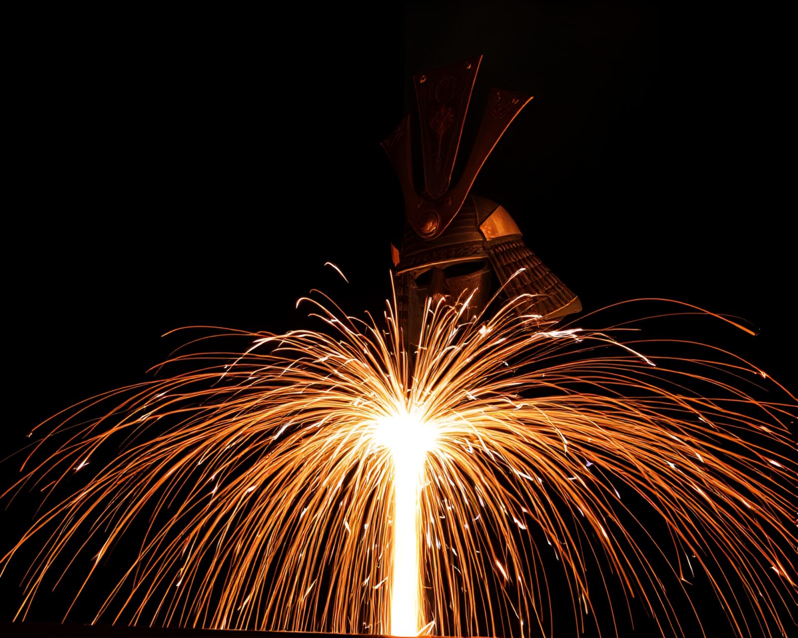 Dynamic art display featuring samurai helmet and sparkler trails